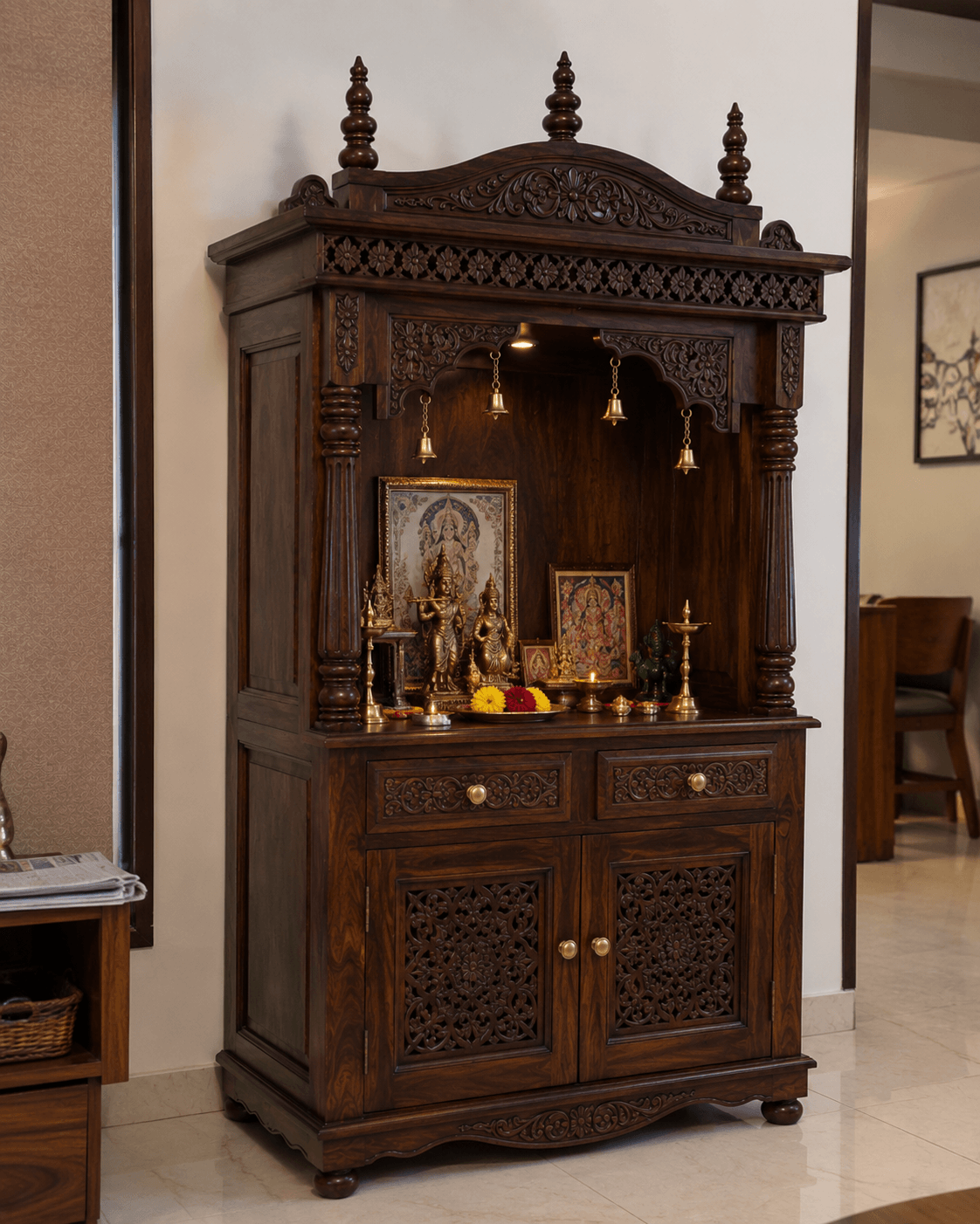 Solid mango wood handcrafted home temple with decorative carved canopy, storage drawers, and walnut finish by Bombay Home Decor LLC.
